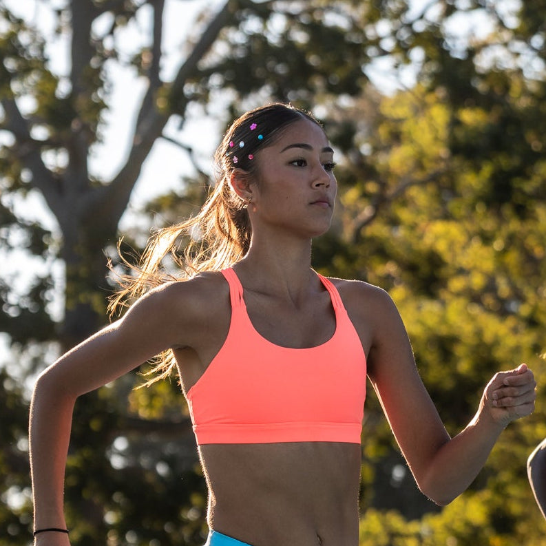 neon coral running crop