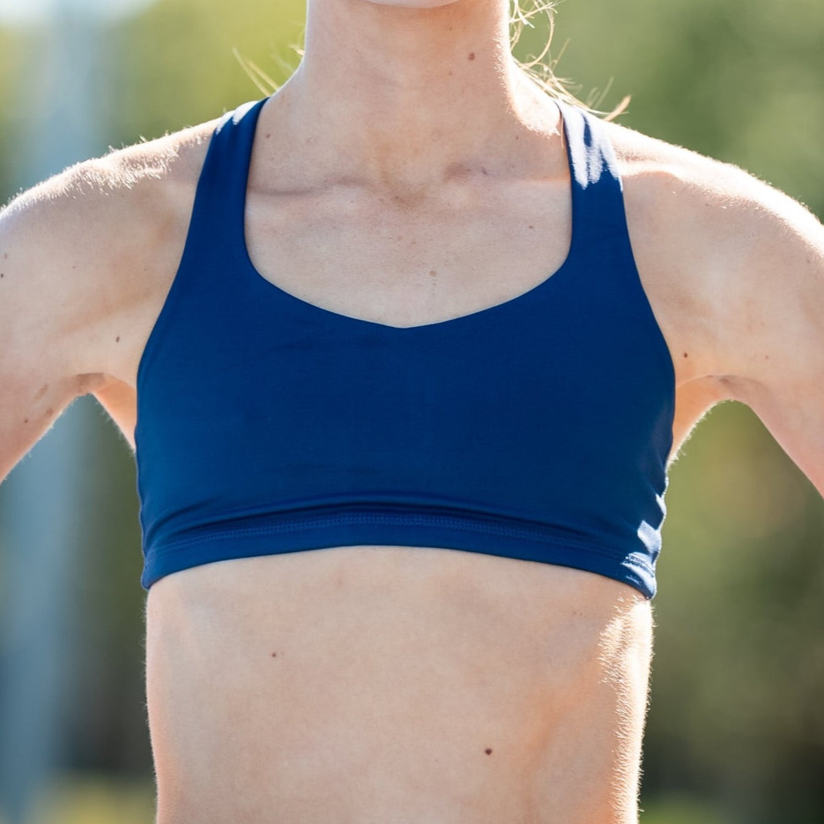 navy strappy running crop